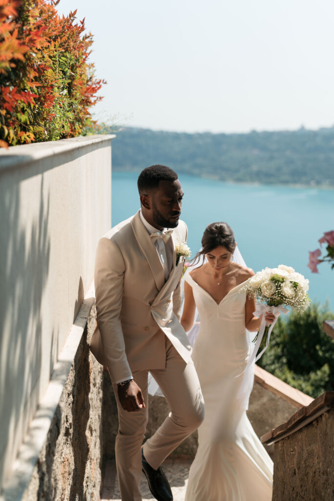 Wedding couple walking up stairs. | Gabys Films