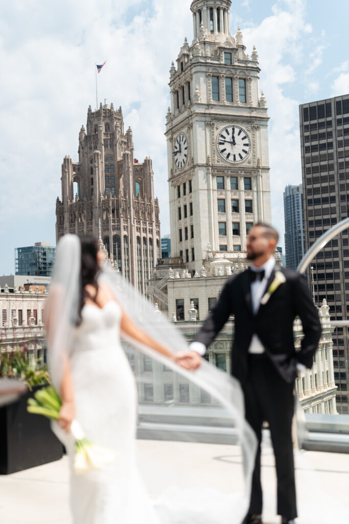 Bride and groom on rooftop. | Gabys Films