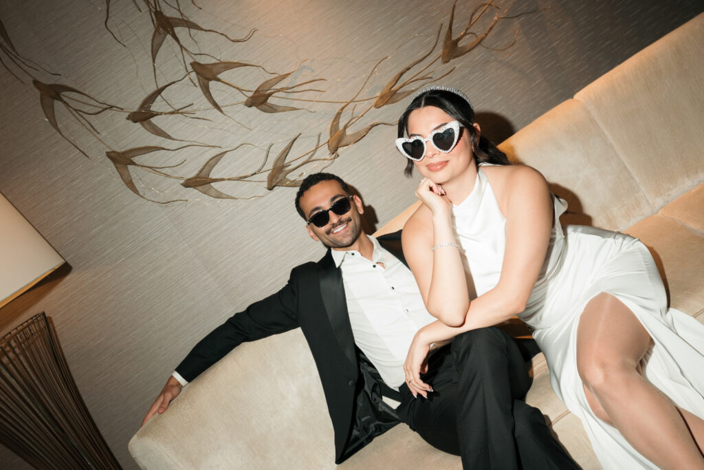 A chic couple wearing sunglasses. | Gabys Films