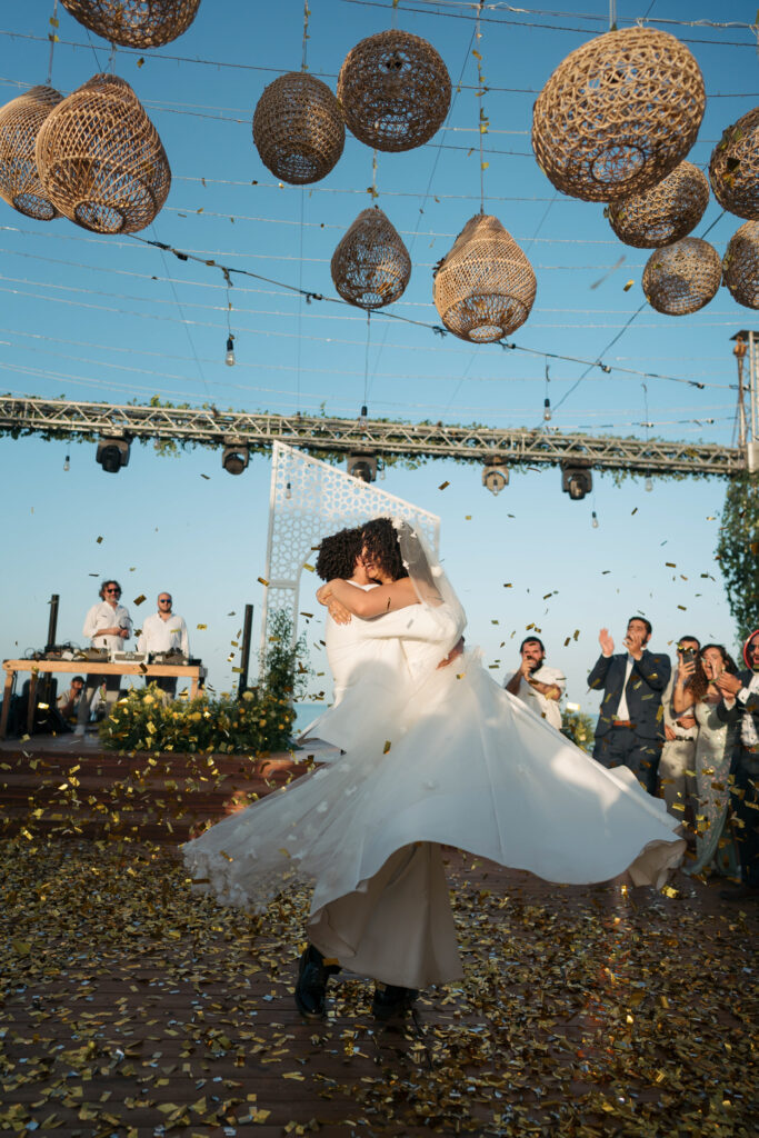 Bride and groom dancing outdoors. | Gabys Films