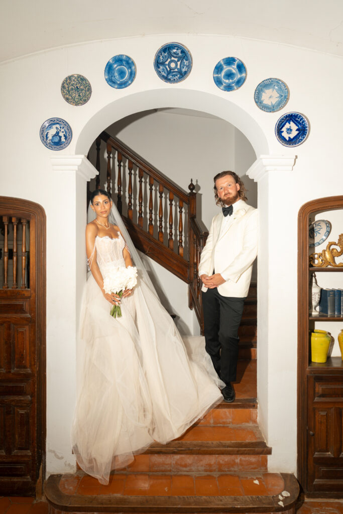 Bride and groom on stairs. | Gabys Films