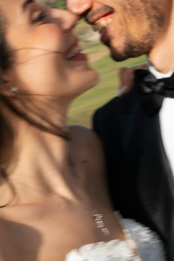 Smiling couple in formal attire. | Gabys Films