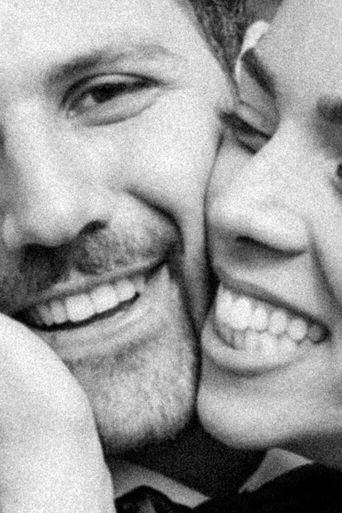 Smiling couple sharing close moment. | Gabys Films