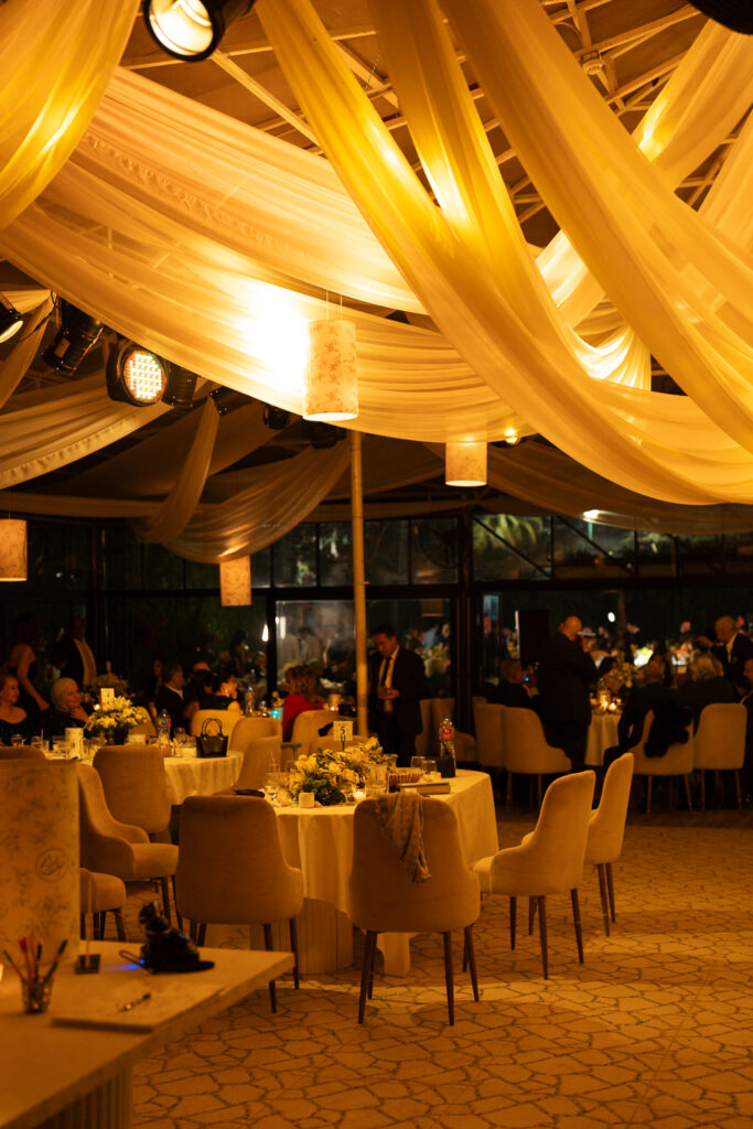 Elegant wedding reception dining area. | Gabys Films
