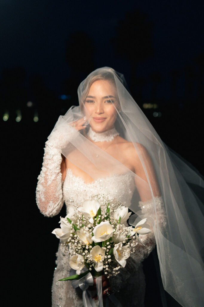 Bride in white lace gown. | Gabys Films