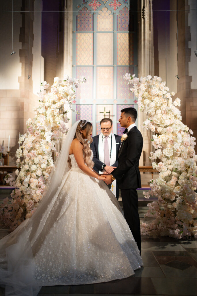 Couple wedding ceremony at altar. | Gabys Films