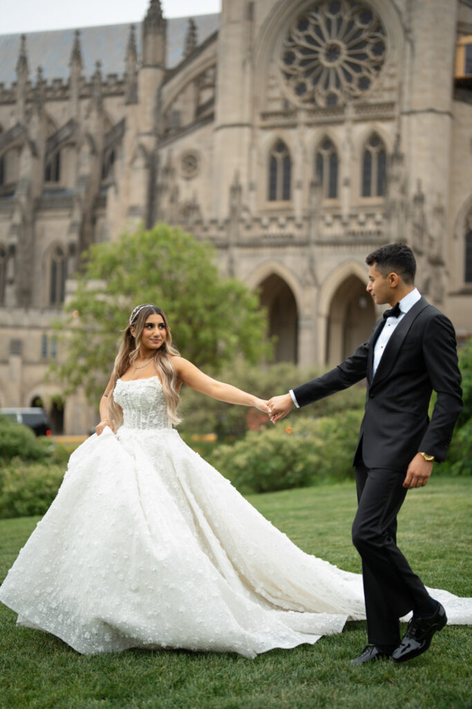 Wedding couple at National Cathedral. | Gabys Films