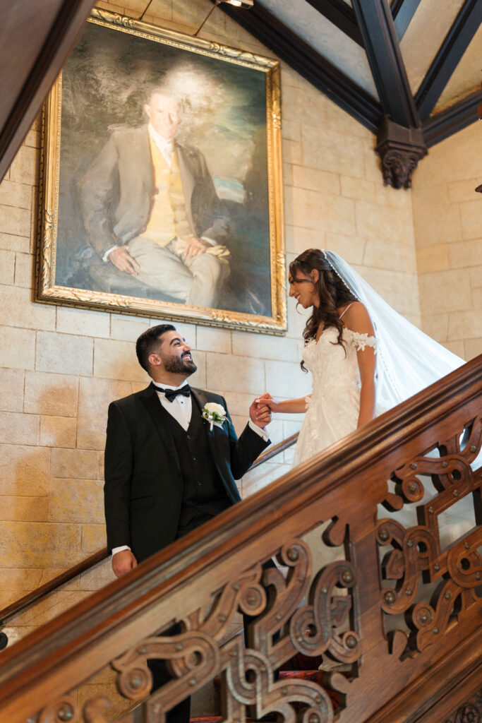Bride and groom on staircase. Gabys Films